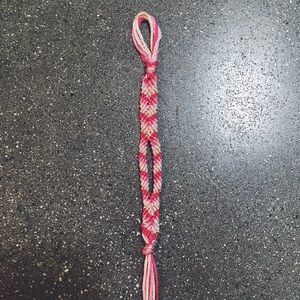 Super cute pink friendship bracelet or key chain!!